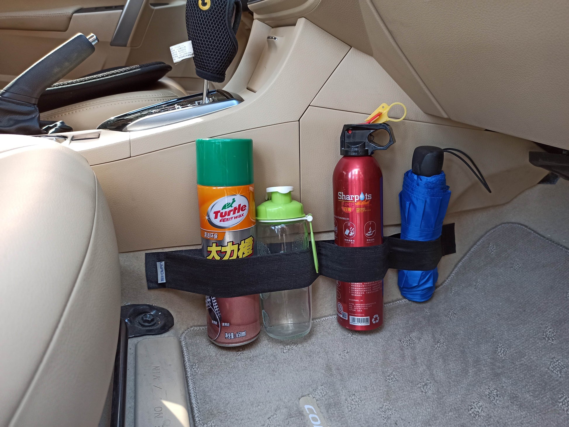 hold items inside of your vehicle, like the umbrella that keeps in rolling beneath your seat